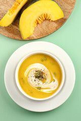 Pumpkin soup. Vegetarian soup with pumpkin seeds in ceramic bowl