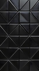 Obraz premium Geometric Arrangement of Glossy Black Triangular Tiles