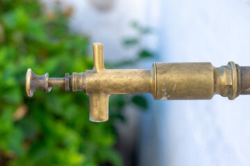 Outdoor push-button tap made of yellow brass