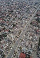 Fototapeta premium Aerial view of urban earthquake aftermath: devastation and destruction in the cityscape