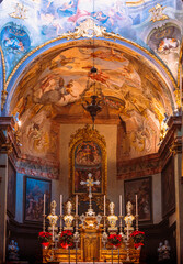 Altar with frescoes in the church of Orta San Giulio