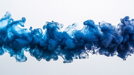 Abstract blue ink swirls in water, isolated on white background.