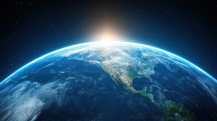 Earth viewed from space with a sunrise on the horizon.