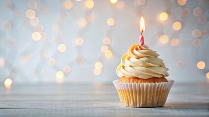 Delicious birthday cupcake with burning candle on light table , birthday, cake,  birthday, cake, lighting, studio