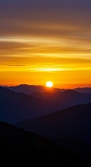 Obraz premium Golden Hour Sunset Sky with Silhouetted Mountains