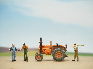Mini toy of action figure at outdoor with blurred background. Toy photography concept design....