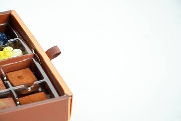 Box of chocolates isolated on white background. Top view.