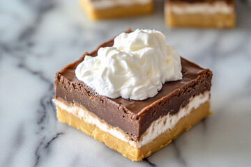 A chocolate and peanut butter fudge with whipped cream on top. (Generative AI)