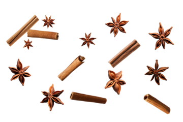 star anise and cinnamon sticks flying in the air on transparent background