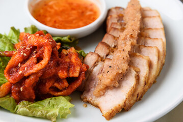 Boiled pork and radish kimchi with garlic