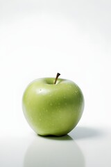 A Single Green Apple on White Background