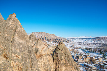 The scenic views of Selime Castle which is the largest and most elaborate cave complex in Cappadocia. The multi-level Byzantine settlement includes a kitchen, halls, church, and rooms in Güzelyurt