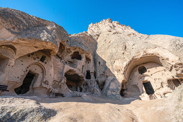 The scenic views of Selime Castle which is the largest and most elaborate cave complex in Cappadocia. The multi-level Byzantine settlement includes a kitchen, halls, church, and rooms in Güzelyurt © Selcuk