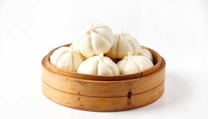 Steamed bao buns in a bamboo steamer on a white background