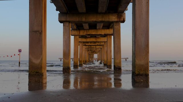 Under the pier at Surfside beach, Galveston, TX