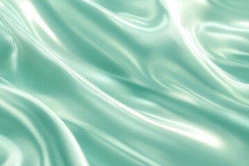 Smooth, flowing mint green silk fabric texture.