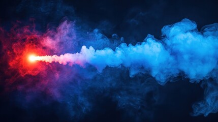 Red and blue smoke trail against dark background. Ideal for designs needing dynamic, vibrant energy.