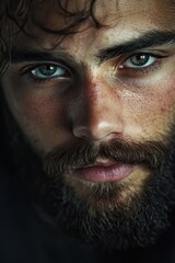 Obraz premium A man with a beard and green eyes