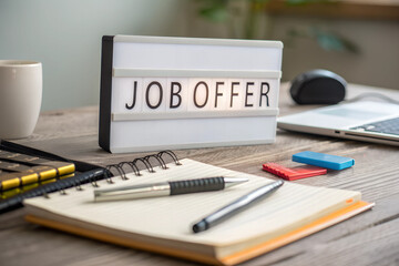 Job offer - sign on the table