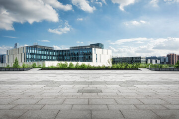 Naklejka premium Contemporary Urban Architecture Surrounded by Scenic Greenery