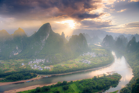 Panoramic sunrise over the Karst mountain natural landscape from Xianggong Mountain, with cloudy sky