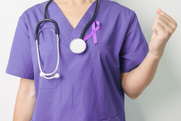 Doctor holding purple Ribbon for Violence, Pancreatic, Esophageal, Testicular cancer, Alzheimer,...
