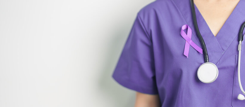 Doctor holding purple Ribbon for Violence, Pancreatic, Esophageal, Testicular cancer, Alzheimer, epilepsy, lupus, Sarcoidosis and Fibromyalgia. Awareness month and World cancer day concept - Powered by Adobe