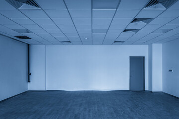 Empty Blue-Toned Room with Modern Architectural Features