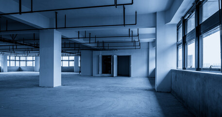 Spacious Industrial Interior with Natural Light and Minimalist Design