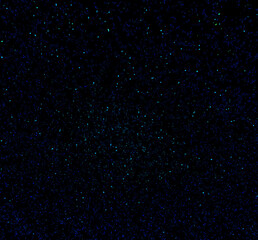 Fototapeta premium abstract twinkly multi-color scattered glitter night sky galaxy sparkle creative background