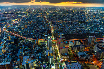 Cityscape of Osaka city Japan at sunset, Osaka skyline in twilight light.