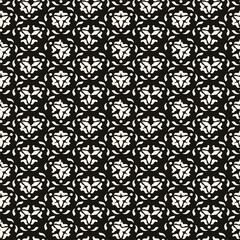 Vector geometric floral pattern. Ornamental seamless texture in traditional ethnic style. Abstract monochrome ornament with flower shapes.