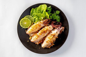 Seafood Fried Squid with Garlic and Pepper on white background