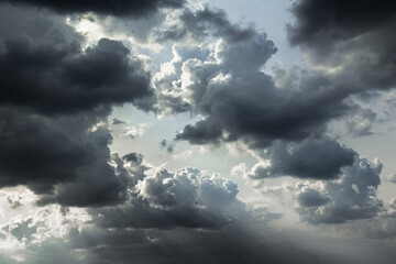 Light in the Dark and Dramatic Storm Clouds