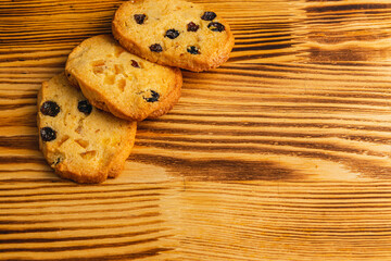 Festive homemade cookies with raisins on a wooden table Christmas concert