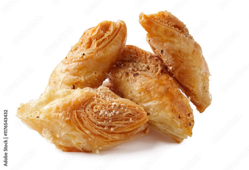 Poster delicious flaky pastry with layers and nuts served on a clean surface in a bright setting