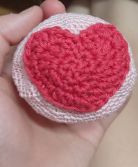 hand holding a heart