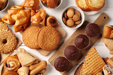 Delicious assortment of baked goods on a wooden table highlighting sweet treats and snacks