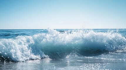 A serene view of ocean waves crashing gently on a sunlit shore.