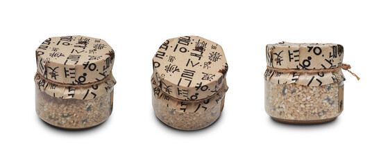 Korean rice in a glass jar with a traditional patterned lid on png transparent background.