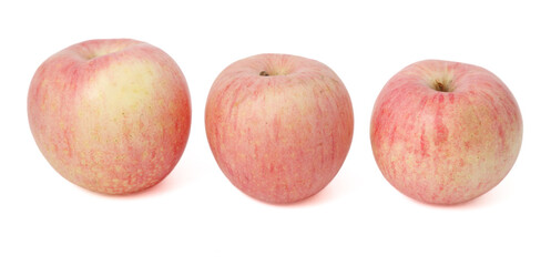 Three apples are shown in a row, with the middle one being the largest