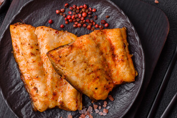 Grilled fish fillet with salt, spices and herbs