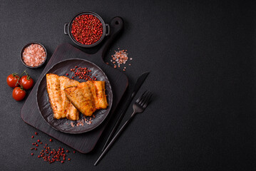 Grilled fish fillet with salt, spices and herbs
