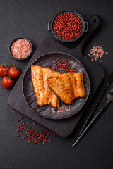 Grilled fish fillet with salt, spices and herbs