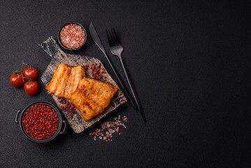 Grilled fish fillet with salt, spices and herbs