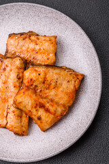 Grilled fish fillet with salt, spices and herbs