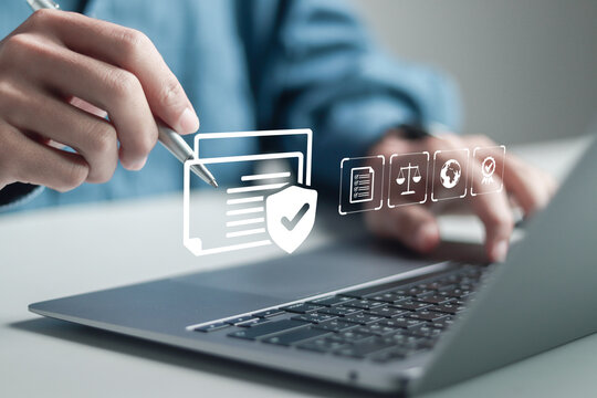 Compliance in business concept. Businessman using laptop with compliance icon, ensuring the enforcement of laws, regulations, and standards. Stay in line with business policies.