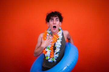 A young attractive man dreams of a vacation.