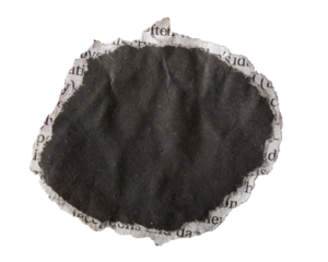Torn circular black newspaper paper