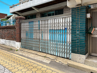 Architectural elements connecting exterior and interior spaces, showcasing various door designs.